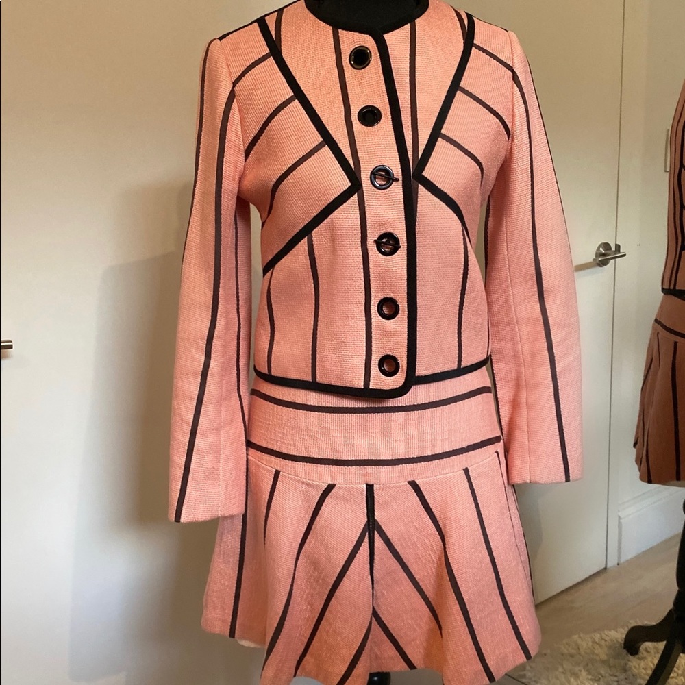 Dress with a jacket.